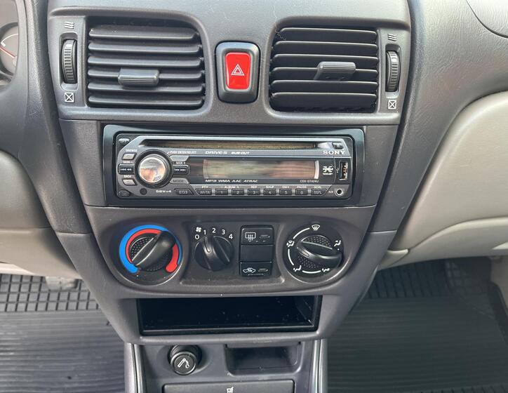 Nissan Almera 15